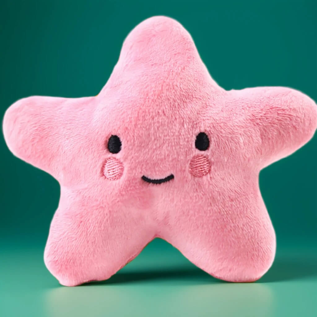 Jouet en peluche pour animaux en forme d'étoile de mer rose souriante. Conception douce et sécurisée, parfait pour le jeu interactif.