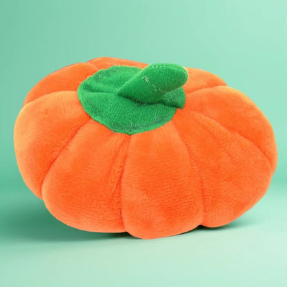 Jouet en peluche en forme de citrouille orange pour chiens et chats. Matériau doux et résistant, idéal pour le jeu et l'interaction.